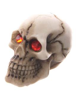 Miniatur Totenschädel mit roten Augen